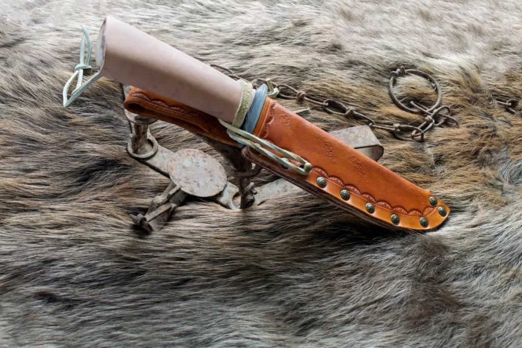 A well-stored Damascus steel knife inside a protective sheath